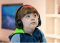 a child wearing noise cancelling headphones