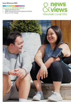 Two young people with downs syndrome are resting after going for a jog. They look happy.